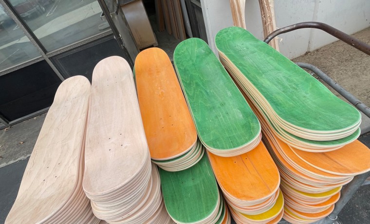 stack of blank decks ready for paint